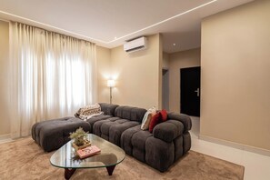 Family Apartment, Balcony, City View | Living area | Flat-screen TV - PHI APARTMENT (Lekki)