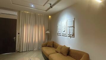 Family Apartment, Balcony, City View | Living area