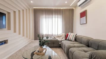 Family Apartment, Balcony, City View | Living area