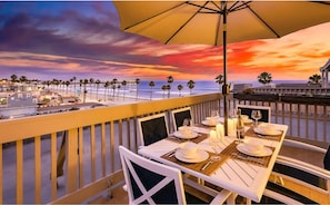 Outdoor dining - Oceanview Penthouse w/ Private Rooftop Deck (Oceanside)