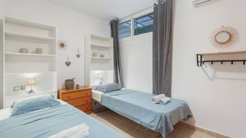 4 dormitorios, tabla de planchar con plancha, wifi y ropa de cama