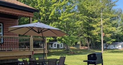 Cozy 2-bedroom cabin in quaint Walkerville with heat and AC for any season.