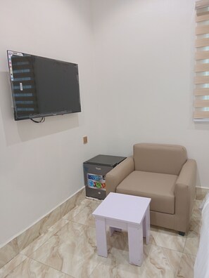 Habitación doble Deluxe | Área de sala de estar