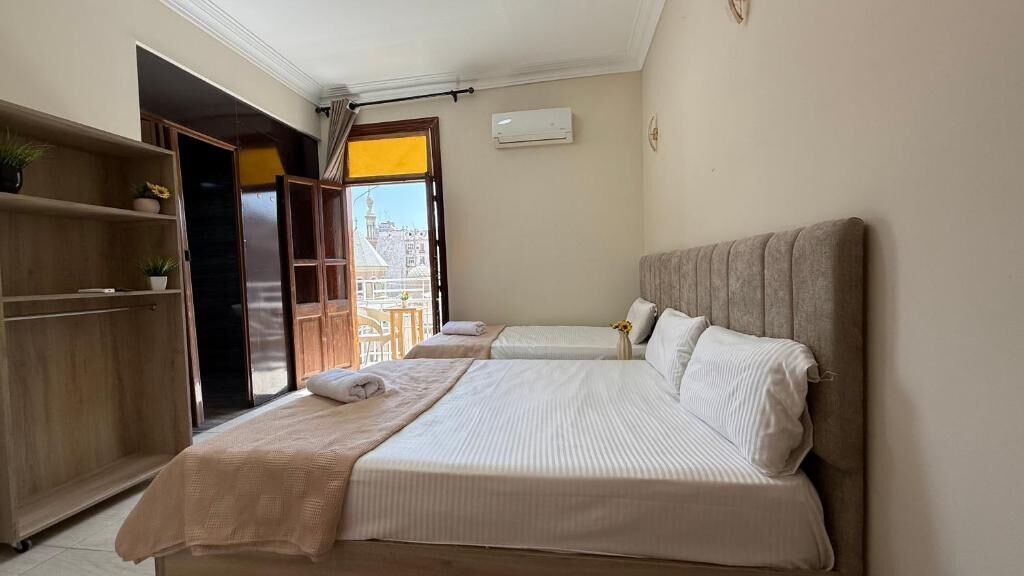 Deluxe dubbelrum - balkong - utsikt mot staden