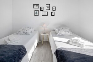 2 chambres, fer et planche à repasser, Wi-Fi, draps fournis