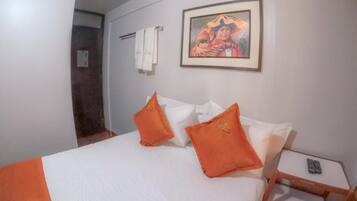 Quarto solteiro clássico, vista para a cidade