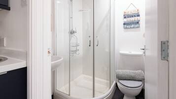 Shower, towels, soap, shampoo