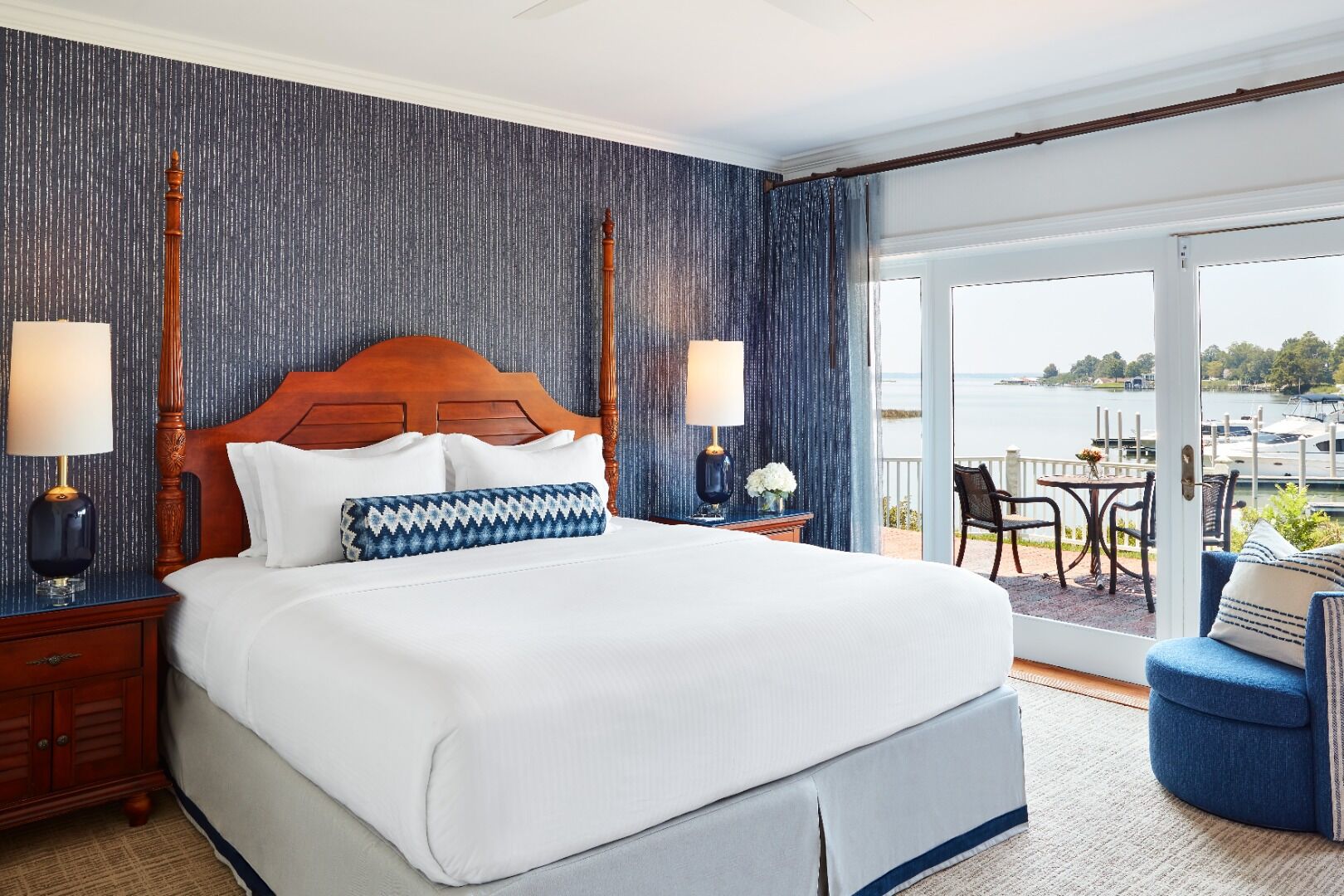 Unwind in crisp linens with balcony breezes and marina views.