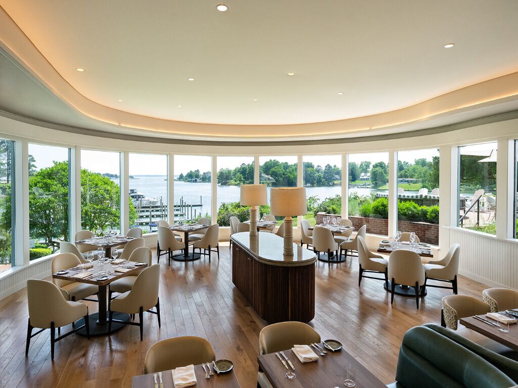 Savor elegant meals surrounded by sweeping waterfront windows.