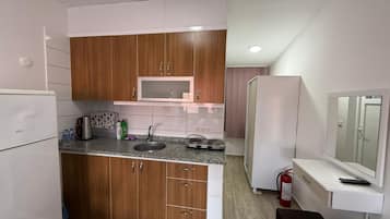 Apartamento, vista para a cidade | Cozinha privada