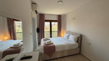 Room, Balcony, City View | Minibar, free WiFi