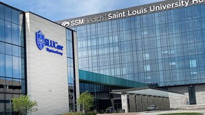 A modern building with the signage "Saint Louis University Hospital" and "SLUCare" on the facade. - Novel King Suite- Central West End near SLU 101 (St. Louis)