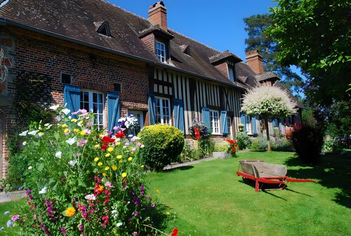 Chambre d’hôtes « Chambre - Les Toits » avec terrasse partagée, jardin commun et Wi-Fi