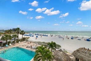 On the beach, sun-loungers, beach towels - Beachfront Getaway with Resort-Style Pool (Madeira Beach)