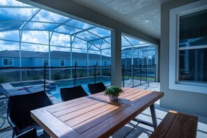 Outdoor dining - 6BR Villa w Pool & Game Room near Disney (Davenport)