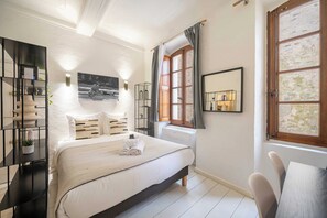 Casa | 1 habitación, tabla de planchar con plancha y ropa de cama 