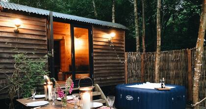 Exciting handbuilt wooden shepherd hut cluster with hot tub
