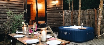 Exciting handbuilt wooden shepherd hut cluster with hot tub