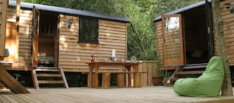 Exciting handbuilt wooden shepherd hut cluster with hot tub