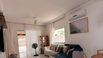 Premium House, Pool Access | Living area | 50-inch Smart TV with digital channels, Netflix, pay films