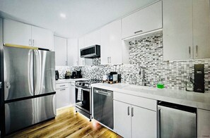 Private kitchen - Gorgeous Remodelled 3-bedroom Condo on the Sand in Huntington Beach! (Huntington Beach)