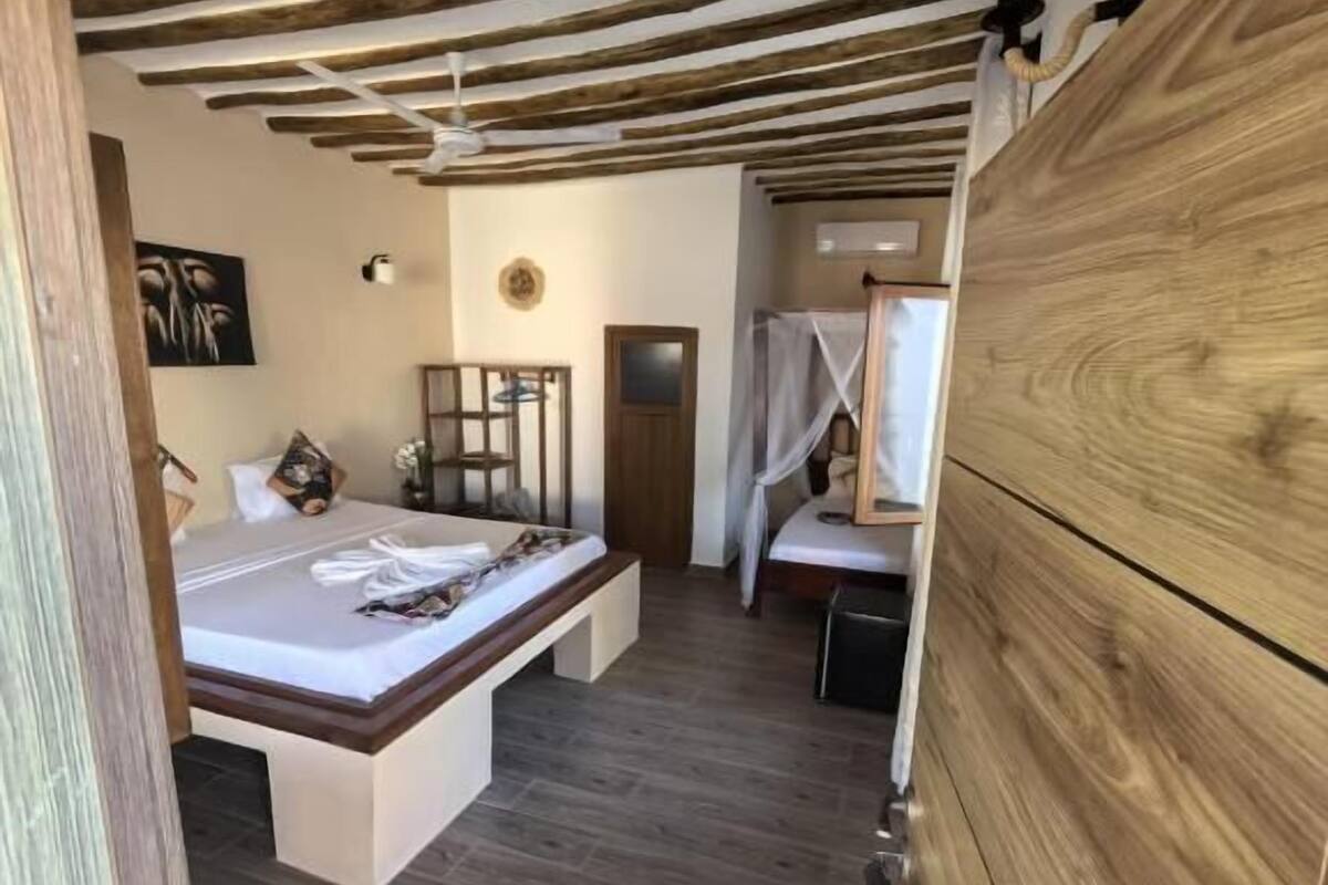 Chambre Triple, vue piscine