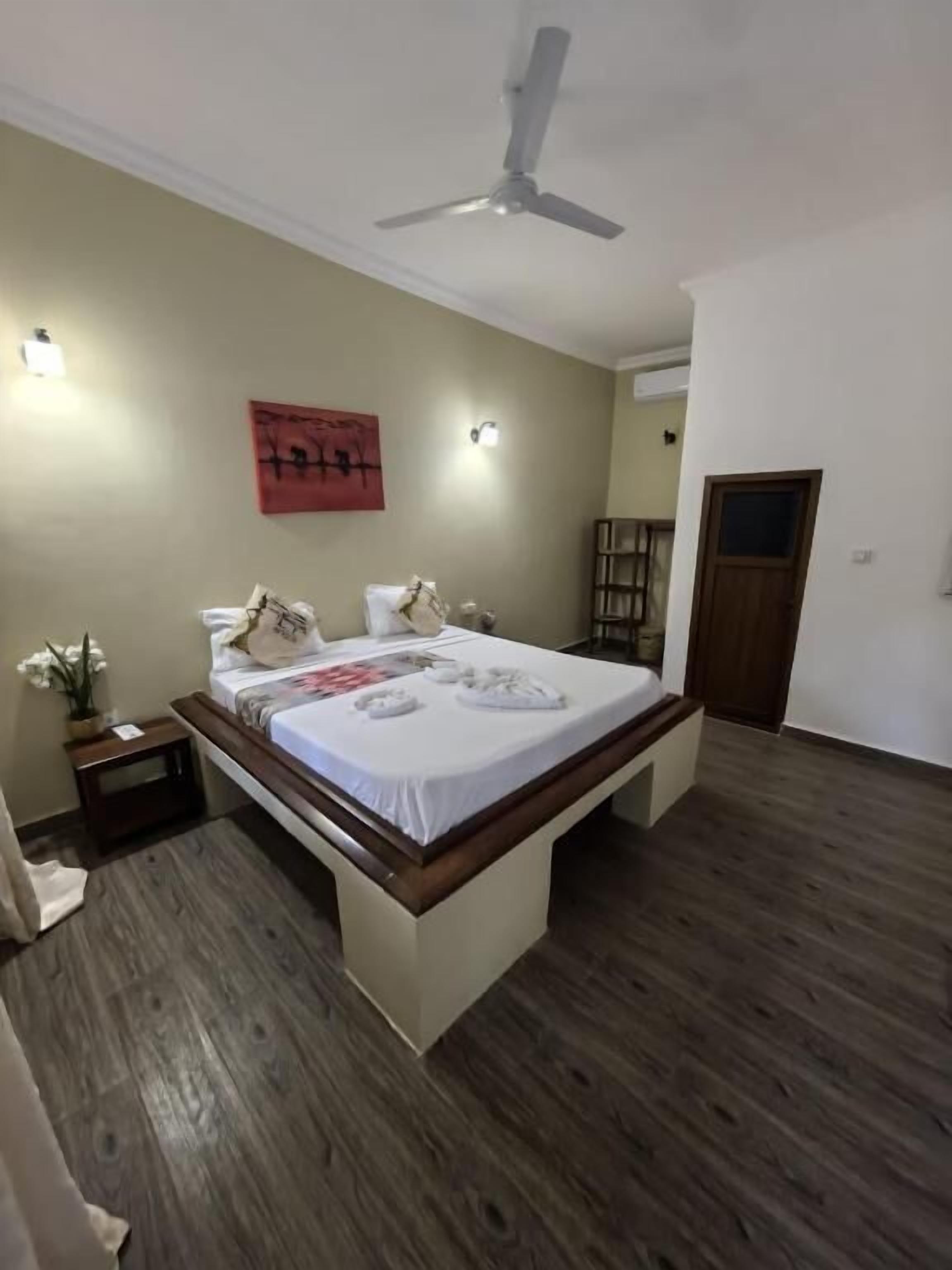 Quarto casal, vista para a piscina