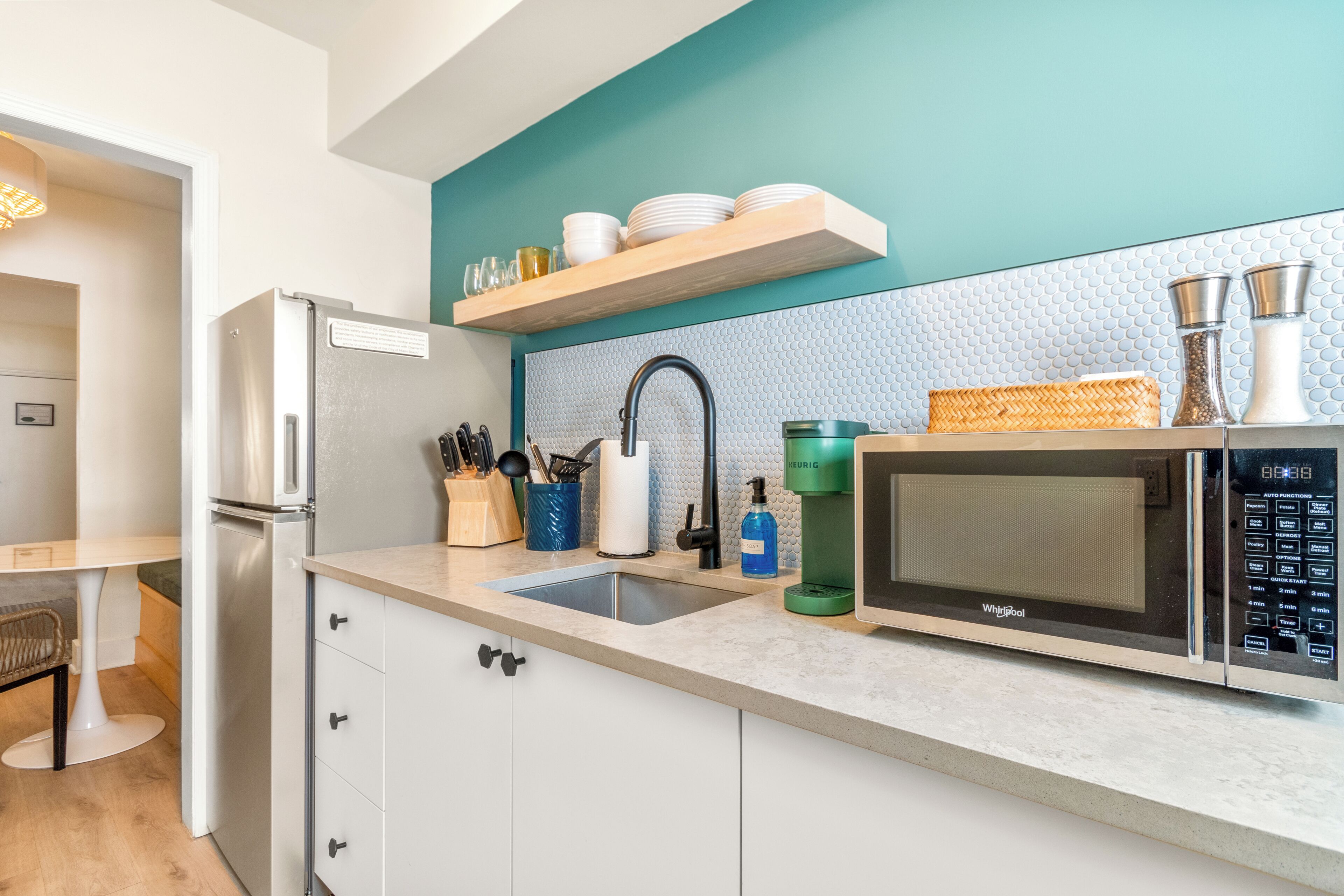 Fridge, microwave, stovetop, coffee/tea maker