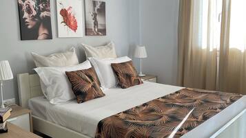 3 habitaciones, tabla de planchar con plancha, wifi y ropa de cama