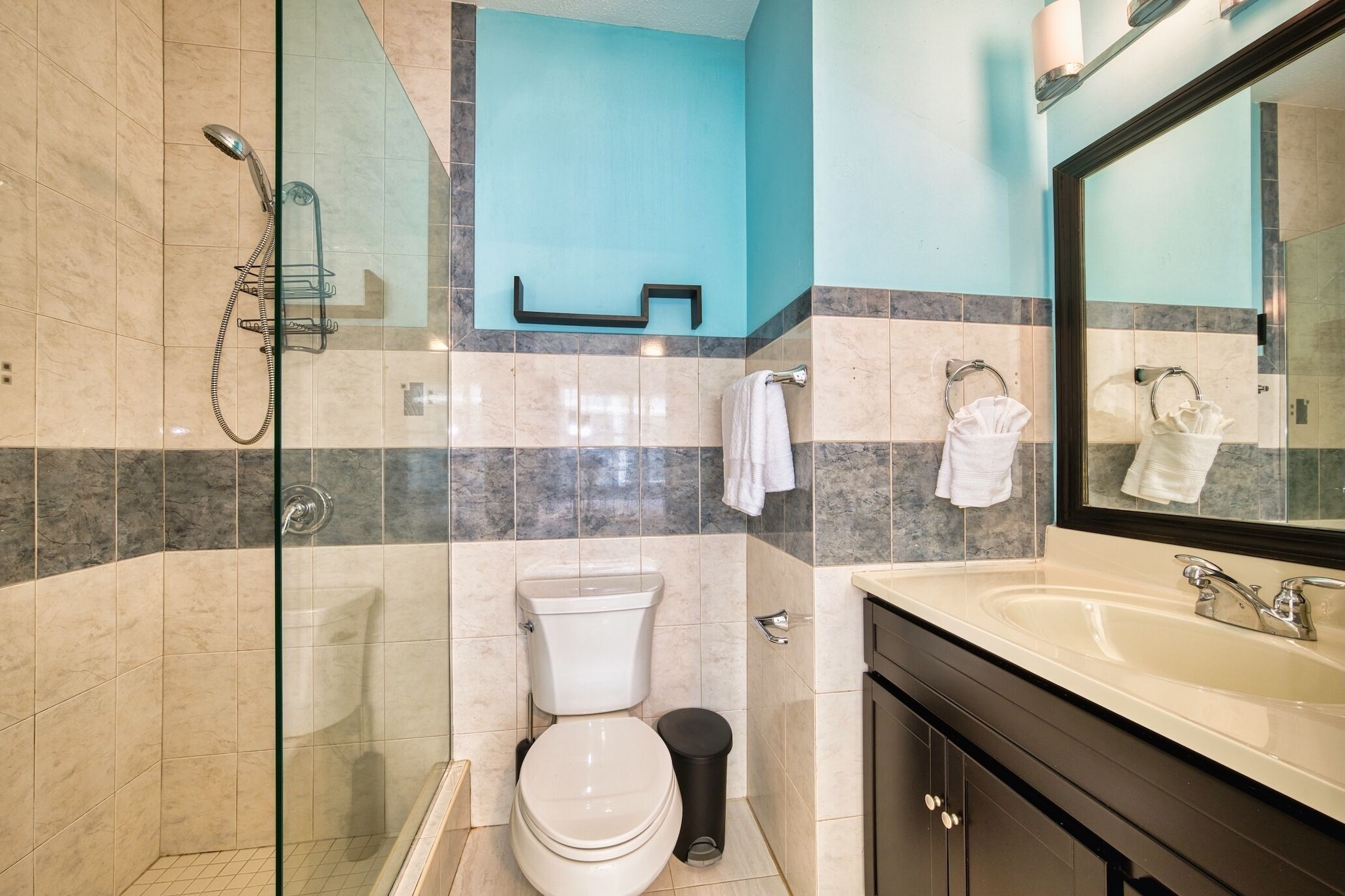 Shower, hair dryer, towels, soap