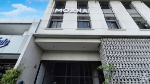 A building with the name 'MOANA' prominently displayed on the facade. - Colletion O near Living Plaza Cirebon fo (West Cirebon)