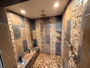 Shower, towels, soap, toilet paper