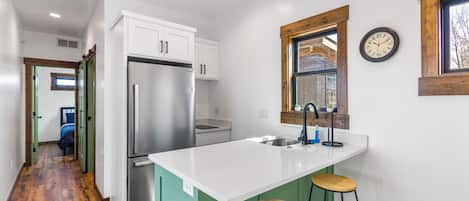 Fridge, microwave, stovetop, coffee/tea maker