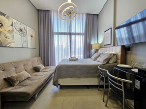 Studio dành cho gia đình, nhiều giường, bếp, quang cảnh bãi biển