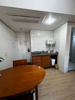 Suite | Private kitchen - Elegance Suítes Ibirapuera Moema (São Paulo)