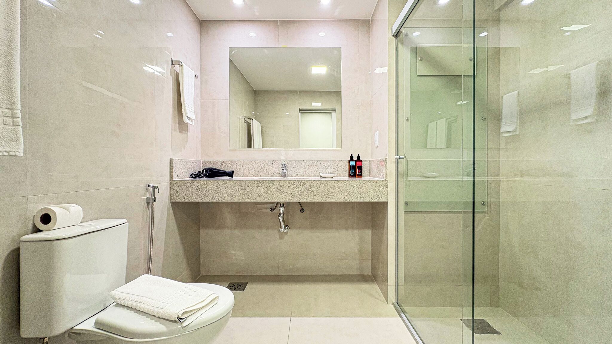 Premium Studio, 2 Queen Beds, City View | Bathroom | Shower, free toiletries, hair dryer, towels