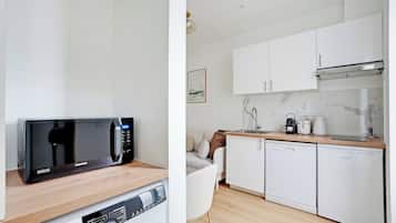 Apartment | Private kitchen | Fridge, microwave, stovetop, dishwasher
