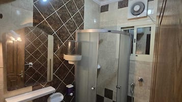Separate tub and shower, free toiletries, towels, soap
