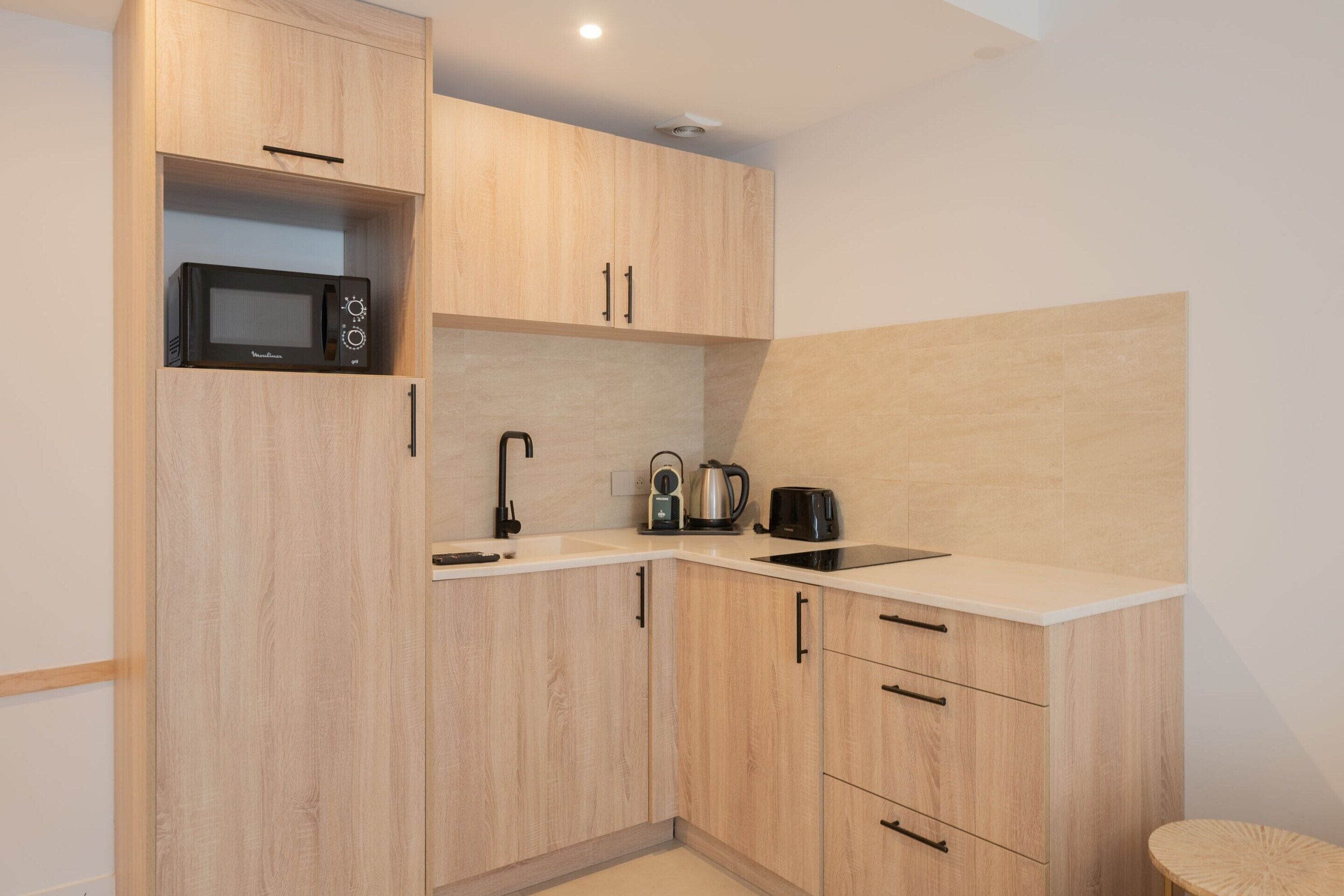 Apartment | Private kitchen | Fridge, microwave, stovetop, coffee/tea maker