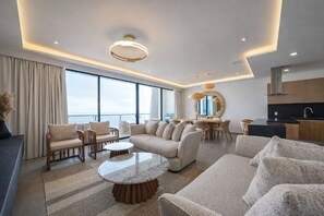 Exclusive Apartment | Living area | 50-inch LED TV with cable channels - Bahiban Residences by Monyxbnb (La Cruz de Huanacaxtle)