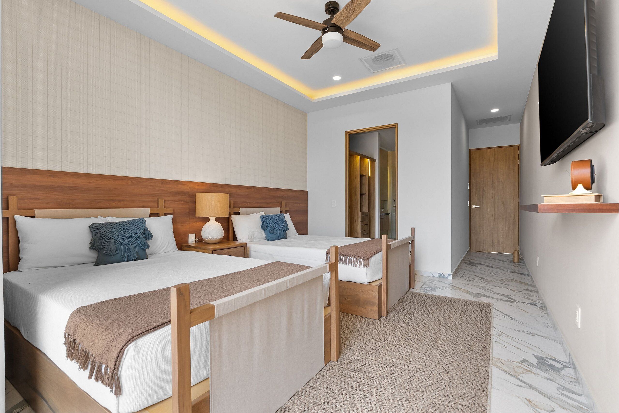 Premium bedding, desk, laptop workspace, blackout curtains