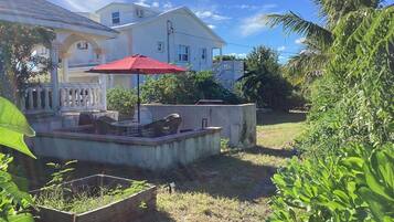 Condo, Balcony, Garden View | Outdoor dining