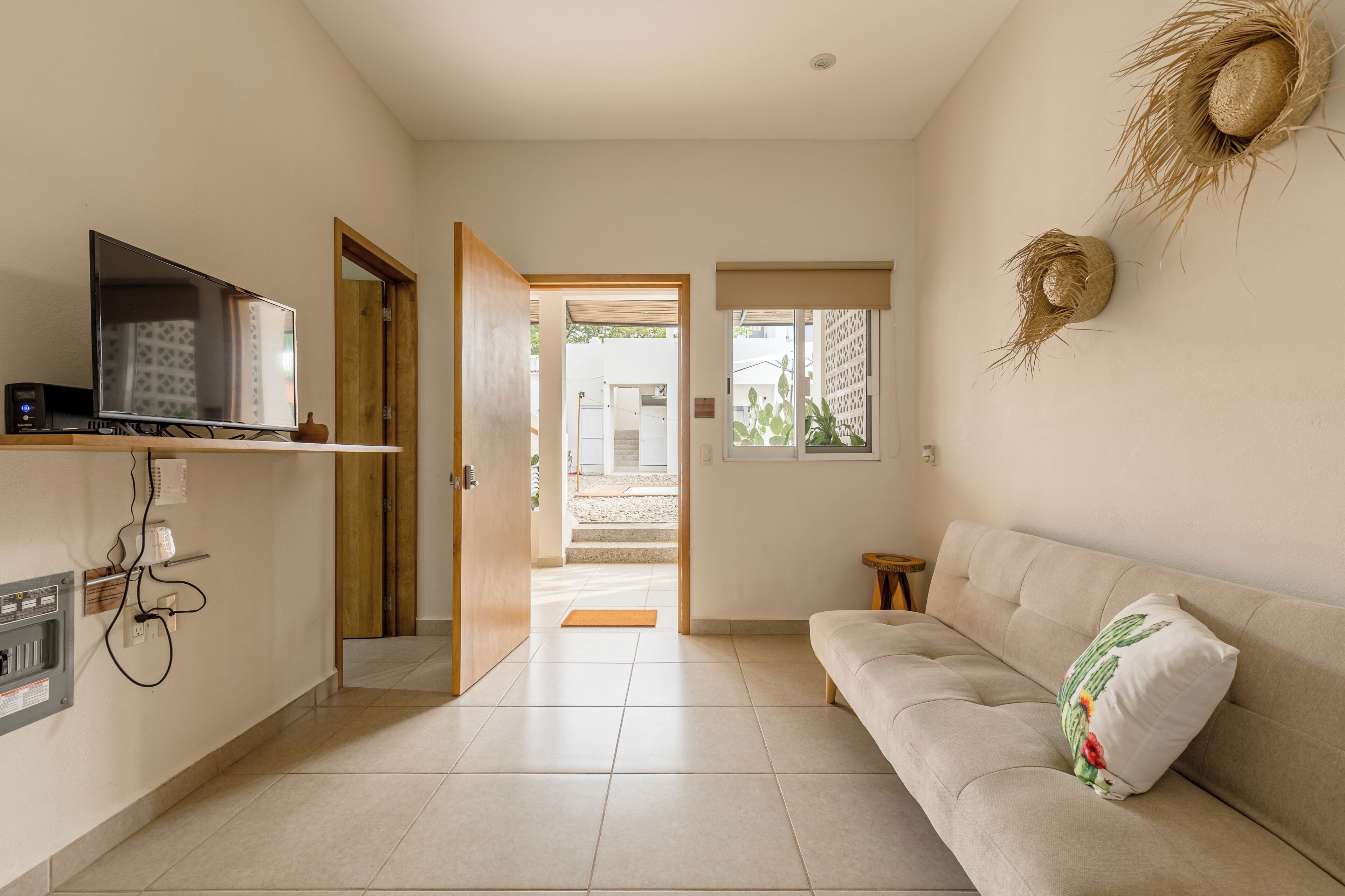 Loft Confort, vista al jardín | Área de sala de estar