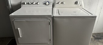 Cozy 2-bedroom house in Minot, with a comfortable living room, AC, and WiFi.