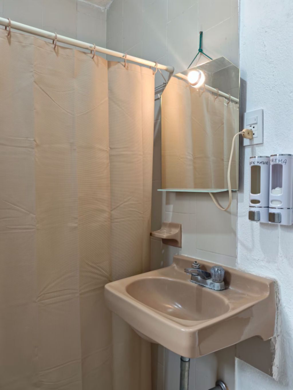 Shower, towels, soap, toilet paper