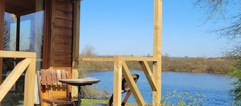 La Roulotte du Marais, nestled in a quiet orchard on the banks of the river