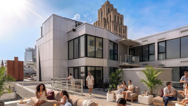 A rooftop lounge with outdoor seating, a modern building in the background, and a clear sky. - Two-Bedroom Suite | Private Apartment Old Montreal, Quiet Retreat, King Bed (Montréal)