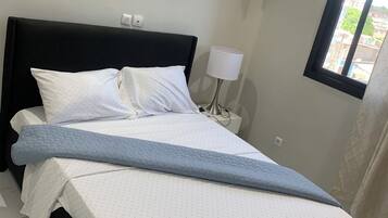 Appartement Deluxe, vue ville | Fer et planche à repasser, Wi-Fi gratuit, draps fournis