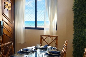 Dining - Beachfront property, 13th floor, heated pool, air conditioning in rooms in Guilhermina, sleeps 8. (Praia Grande)
