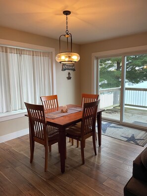Dining - Charming 3-bedroom lake front property on Middle Lake.  Private beach and dock. (Twin Lake)